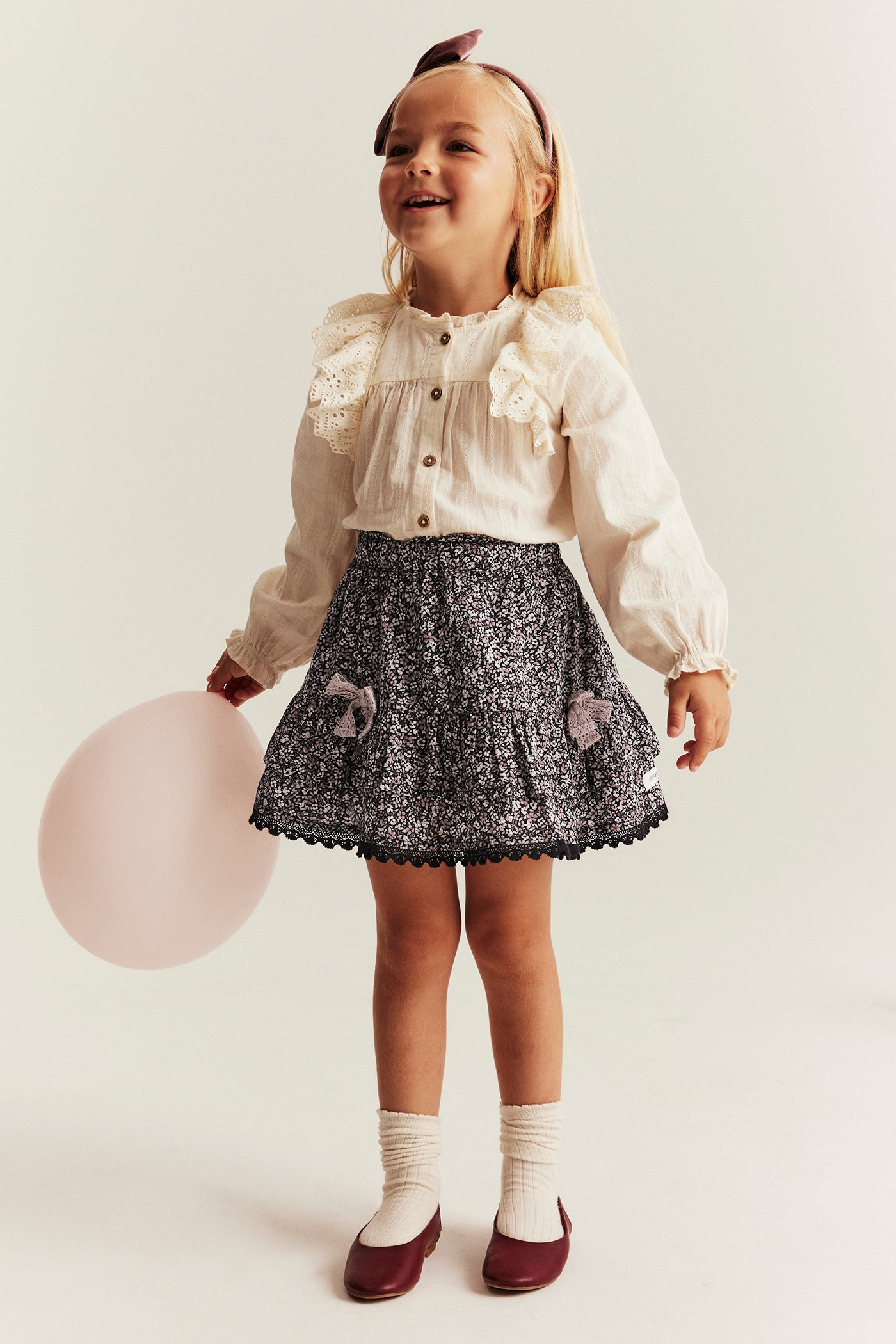 Kids' black ditsy floral skirt with frills
