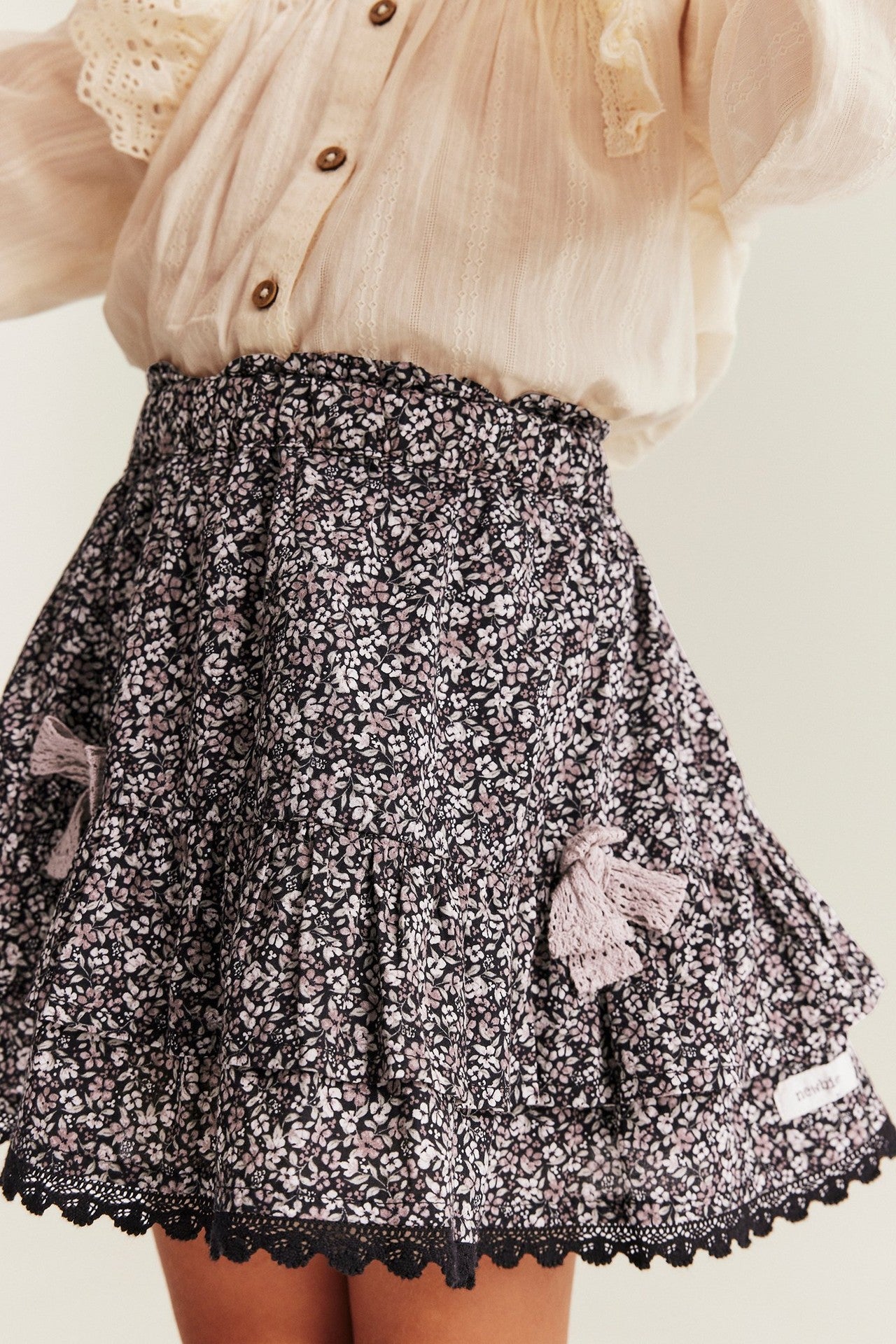 Kids' black ditsy floral skirt with frills