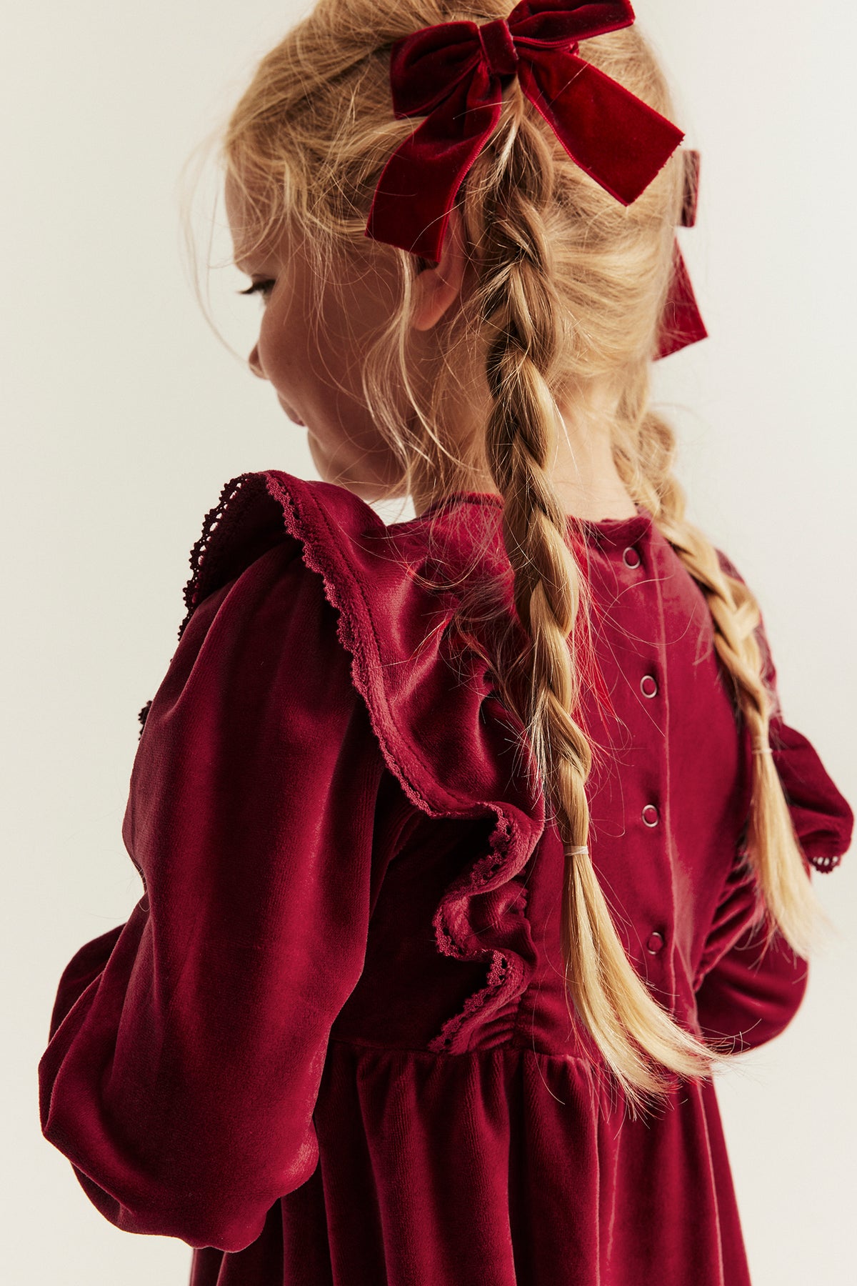 Kids´ red velour dress with frills