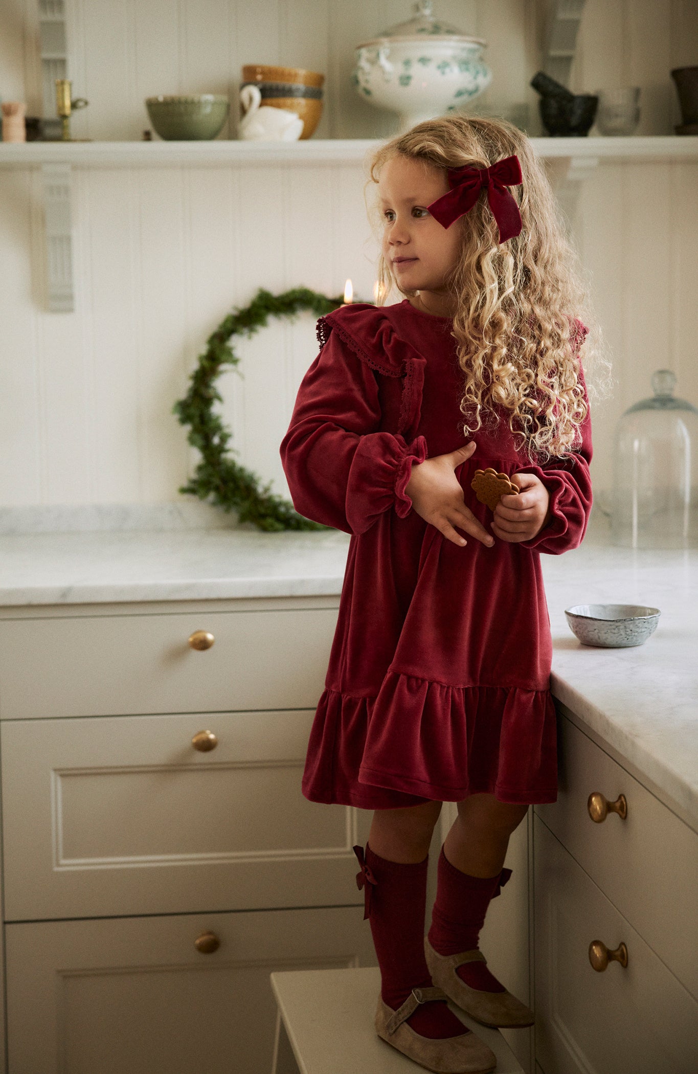 Kids´ red velour dress with frills