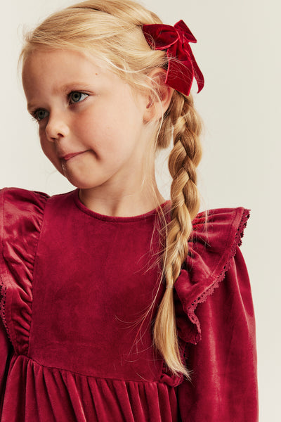 Kids´ red velour dress with frills