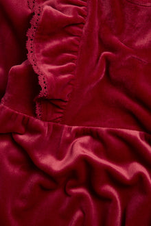 Kids´ red velour dress with frills