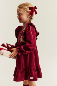 Kids´ red velour dress with frills