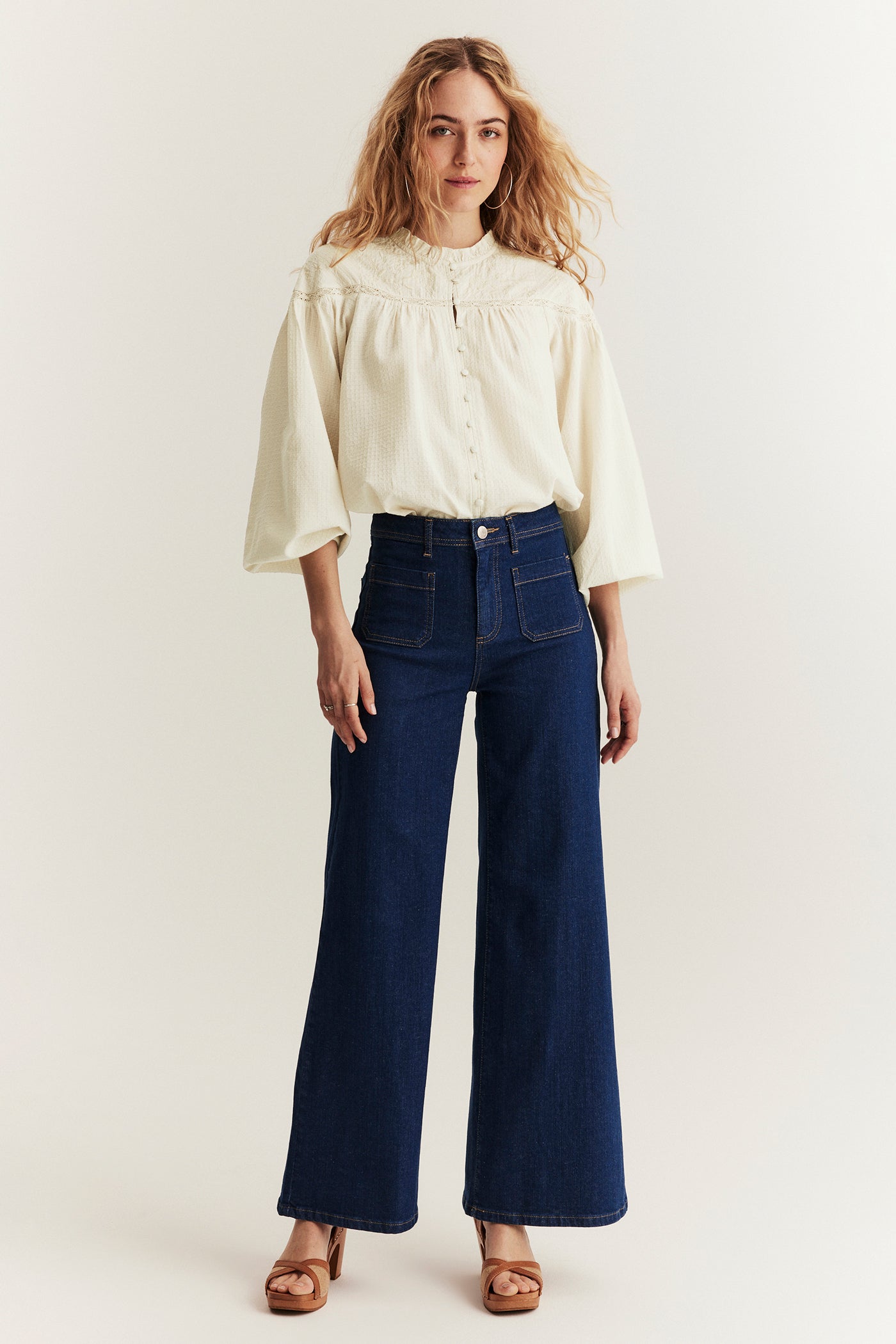 Women's beige blouse with embroidery