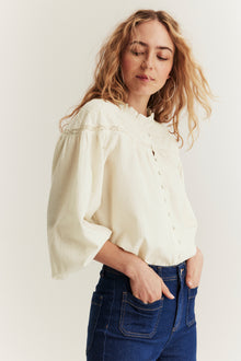 Women's beige blouse with embroidery