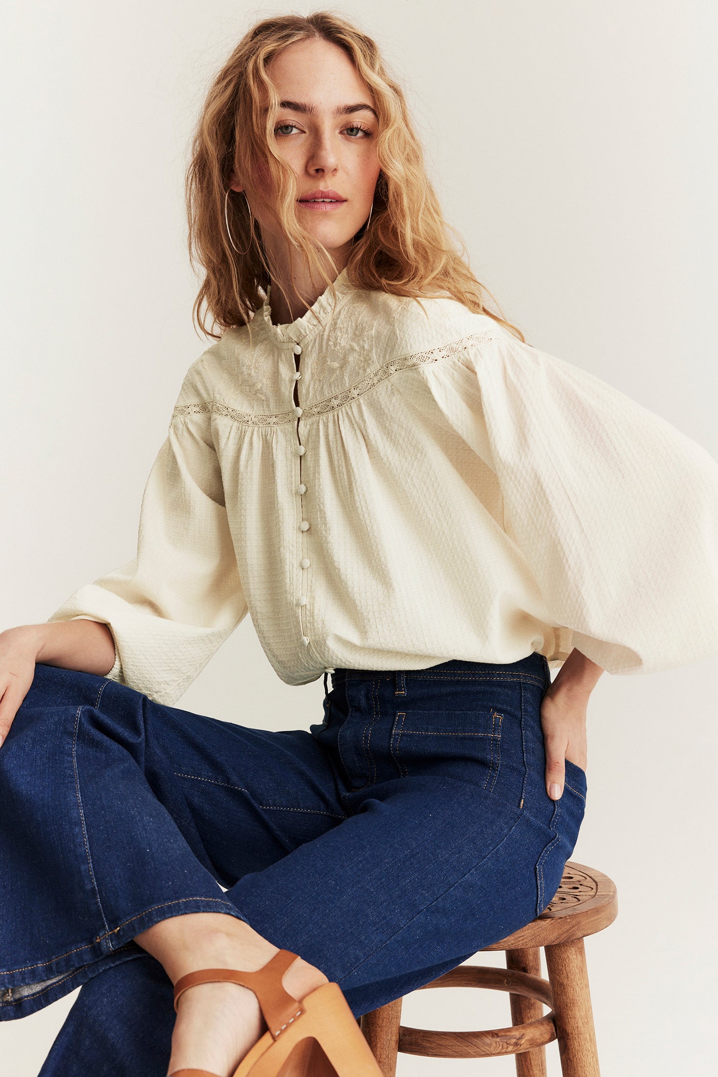 Women's beige blouse with embroidery