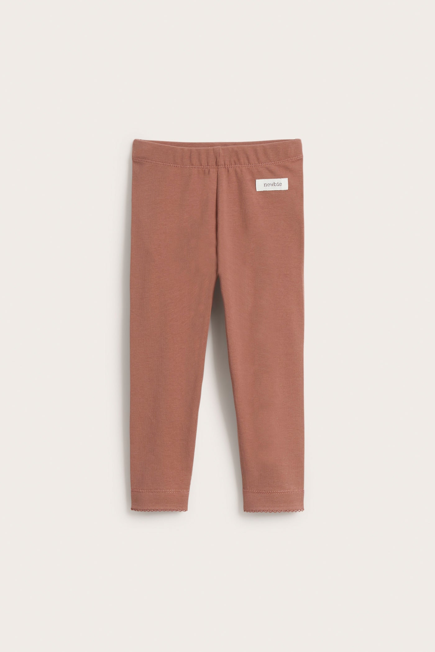 Baby pink leggings with ruffles