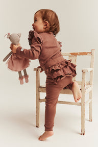 Baby pink leggings with ruffles