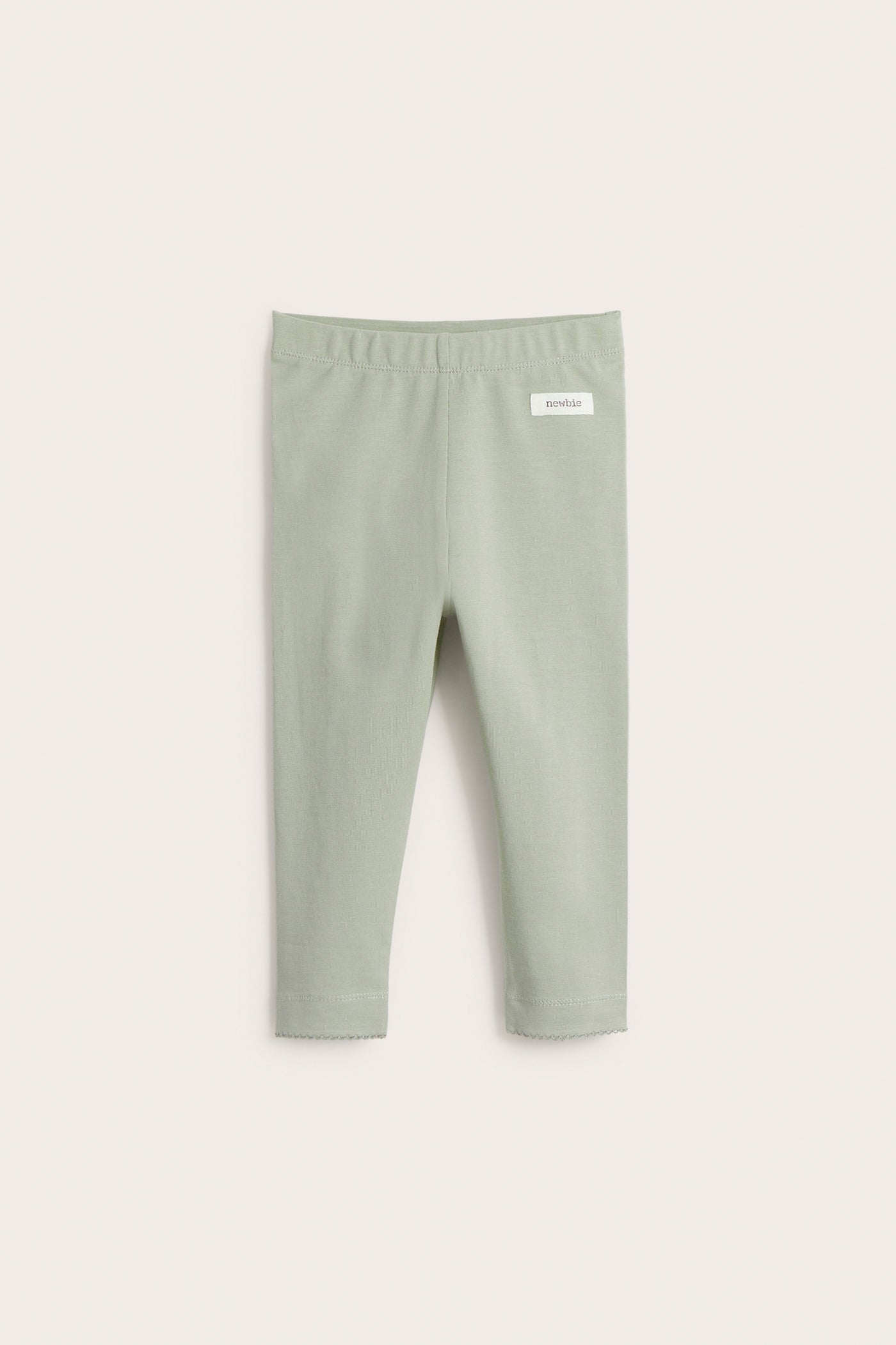 Baby green leggings with ruffles