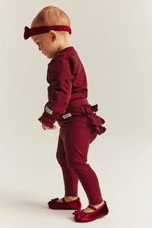 Baby red leggings with ruffles