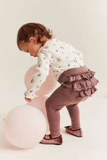Baby pink leggings with ruffles