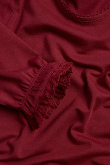 Baby red lace-cuff bodysuit