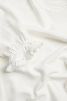 Baby & kids' white top with lace trim