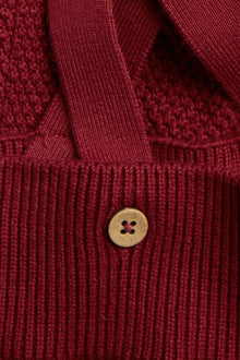 Baby red knitted dungarees