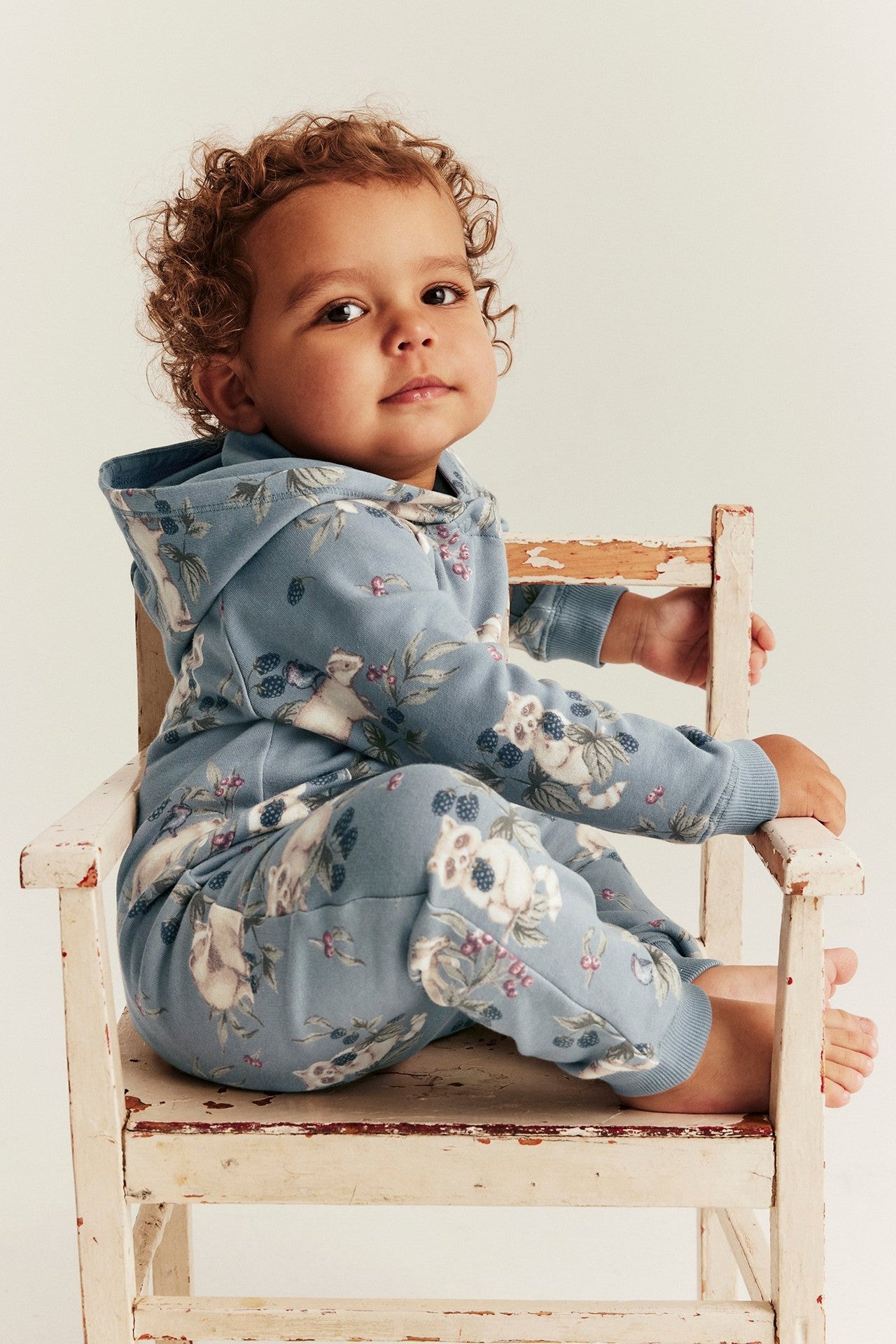 Baby blue raccoon onesie