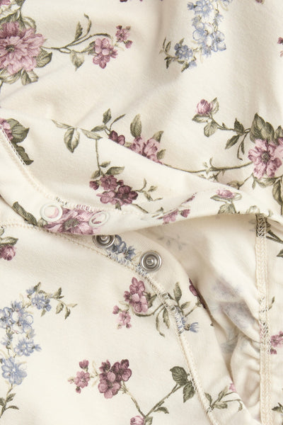 Baby beige floral bodysuit with puff sleeves