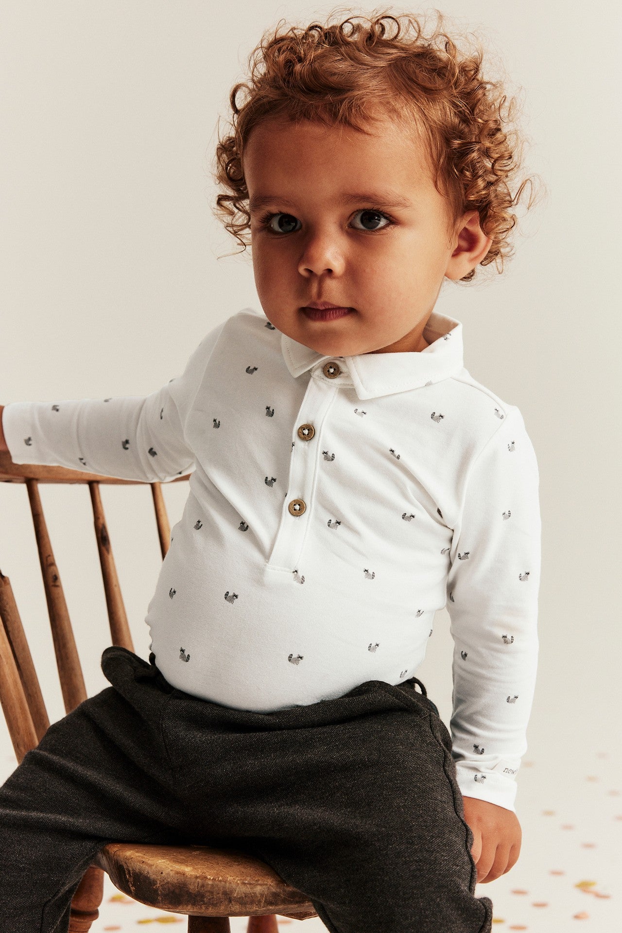 Baby white occasion bodysuit with bow tie