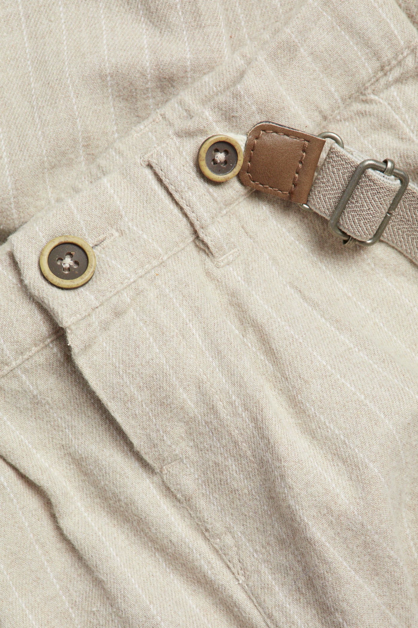 Kids' beige trousers with suspenders