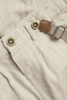 Kids' beige trousers with suspenders