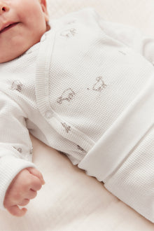 Baby white bodysuit with lamp print