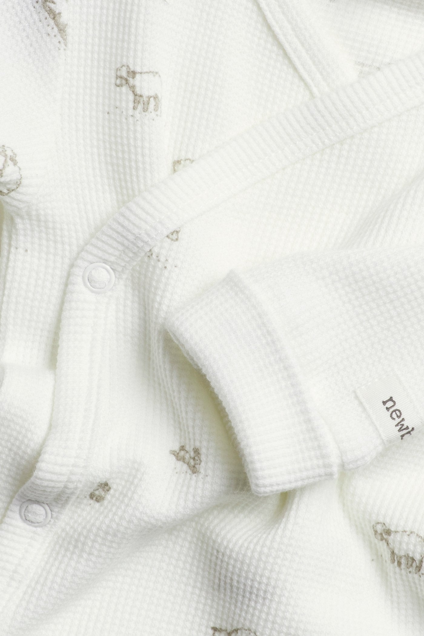 Baby white bodysuit with lamp print