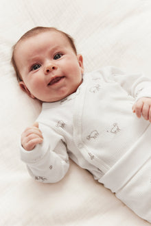 Baby white bodysuit with lamp print