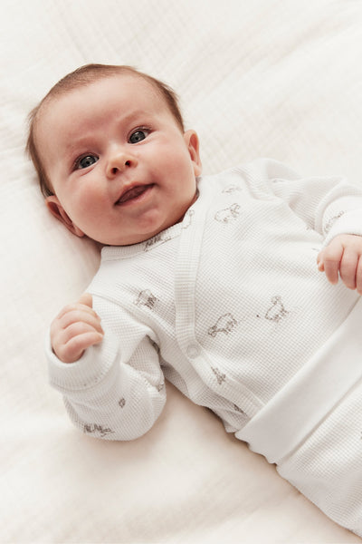 Baby white bodysuit with lamb print