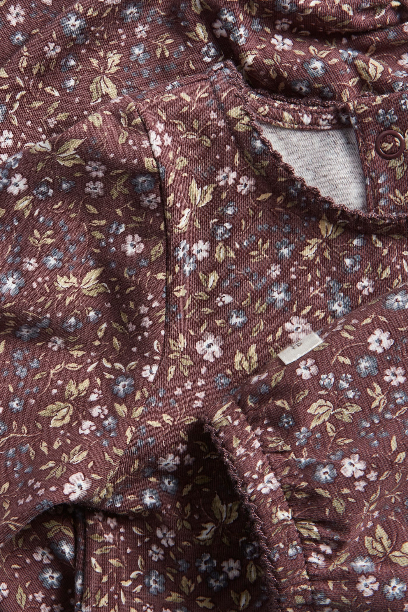 Baby lilac floral bodysuit