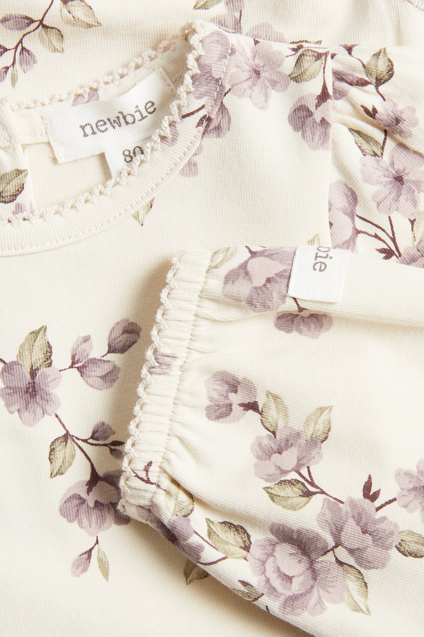 Baby beige floral bodysuit