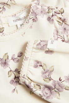 Baby beige floral bodysuit
