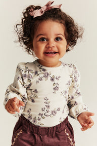 Baby beige floral bodysuit
