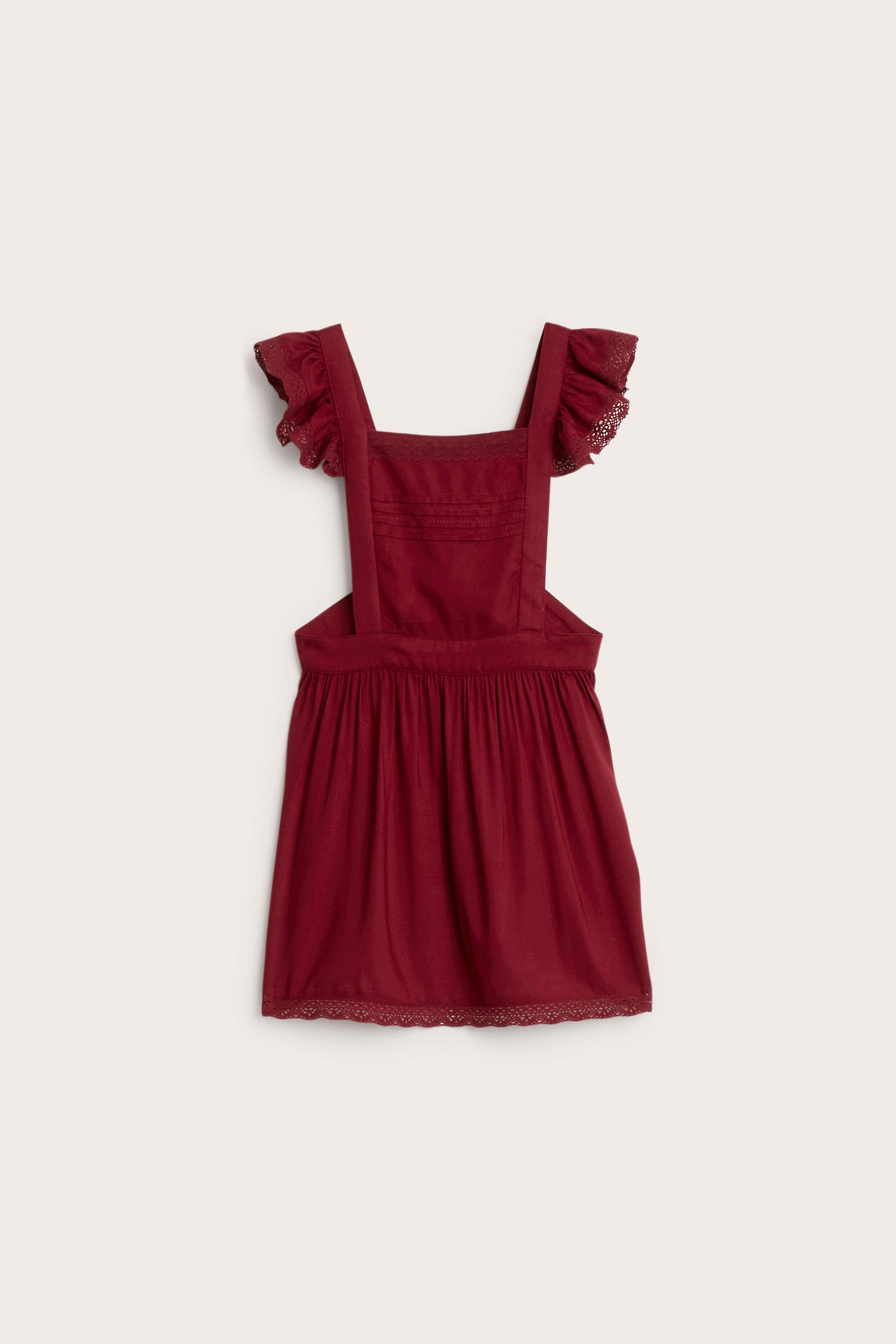 Kids' red apron with frill detail