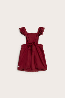 Kids' red apron with frill detail
