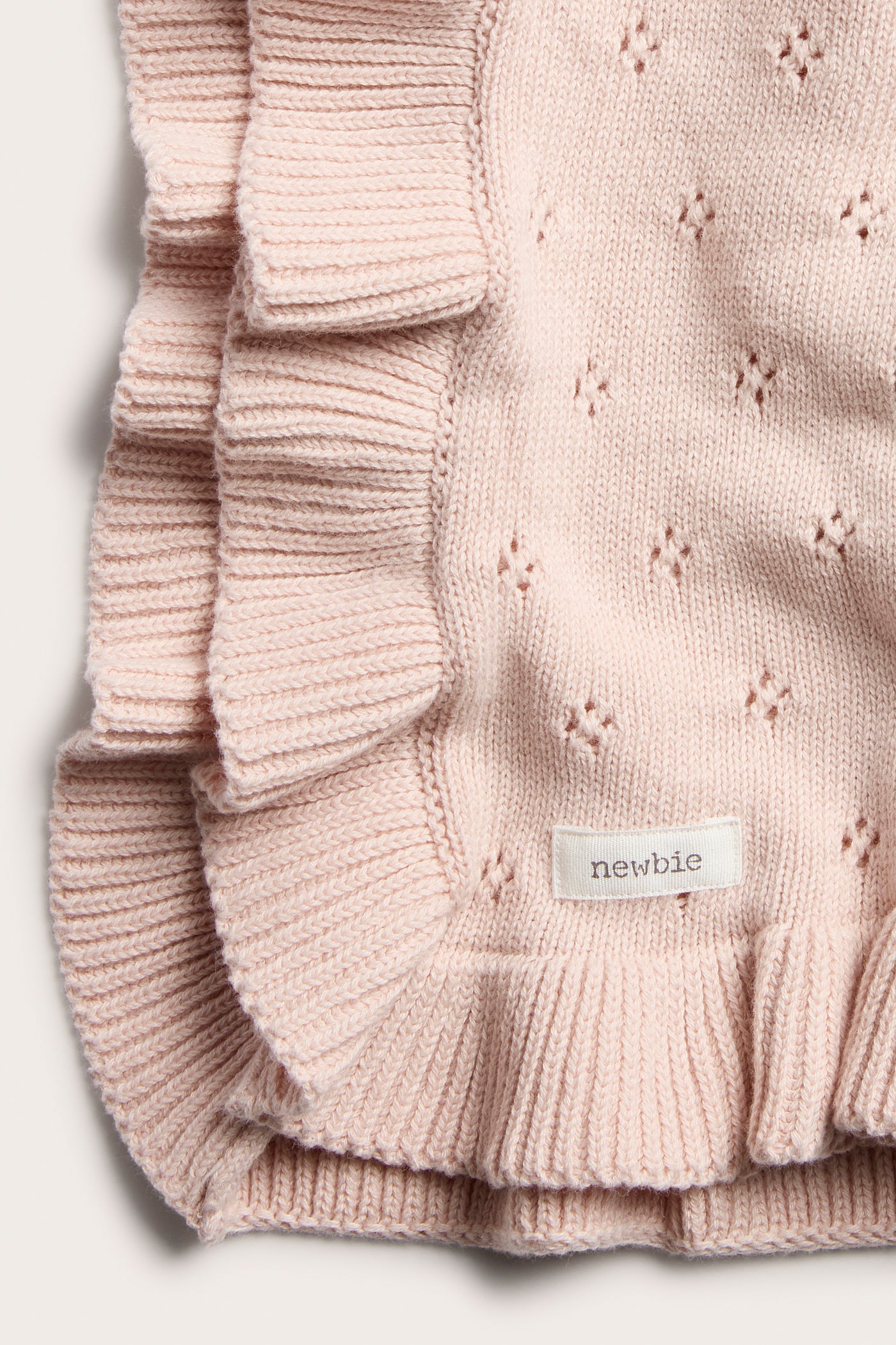 Baby pink knitted blanket