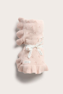 Baby pink knitted blanket