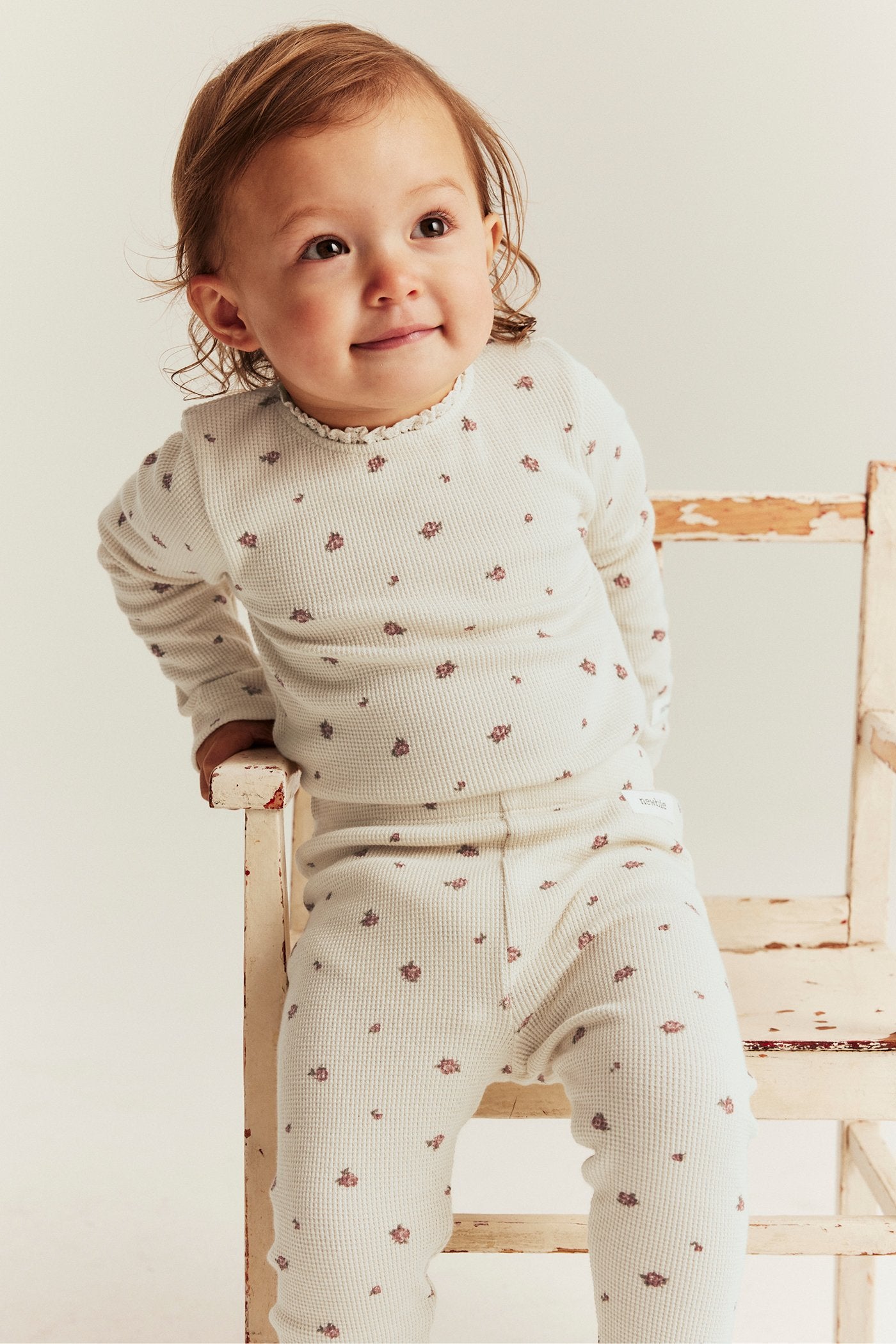 Baby beige floral bodysuit with lace