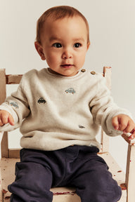 Baby beige knitted jumper with cars