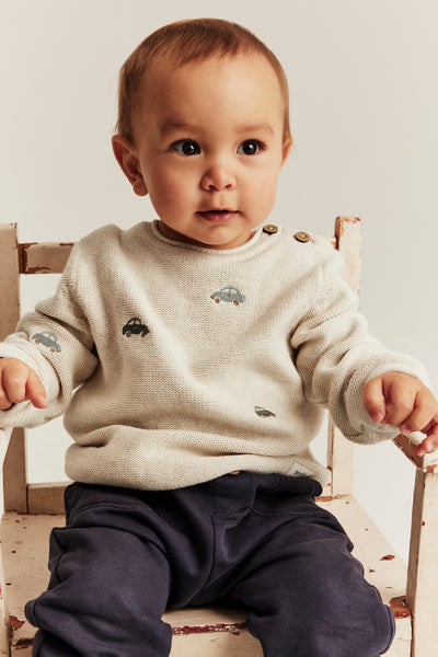 Baby beige knitted jumper with cars