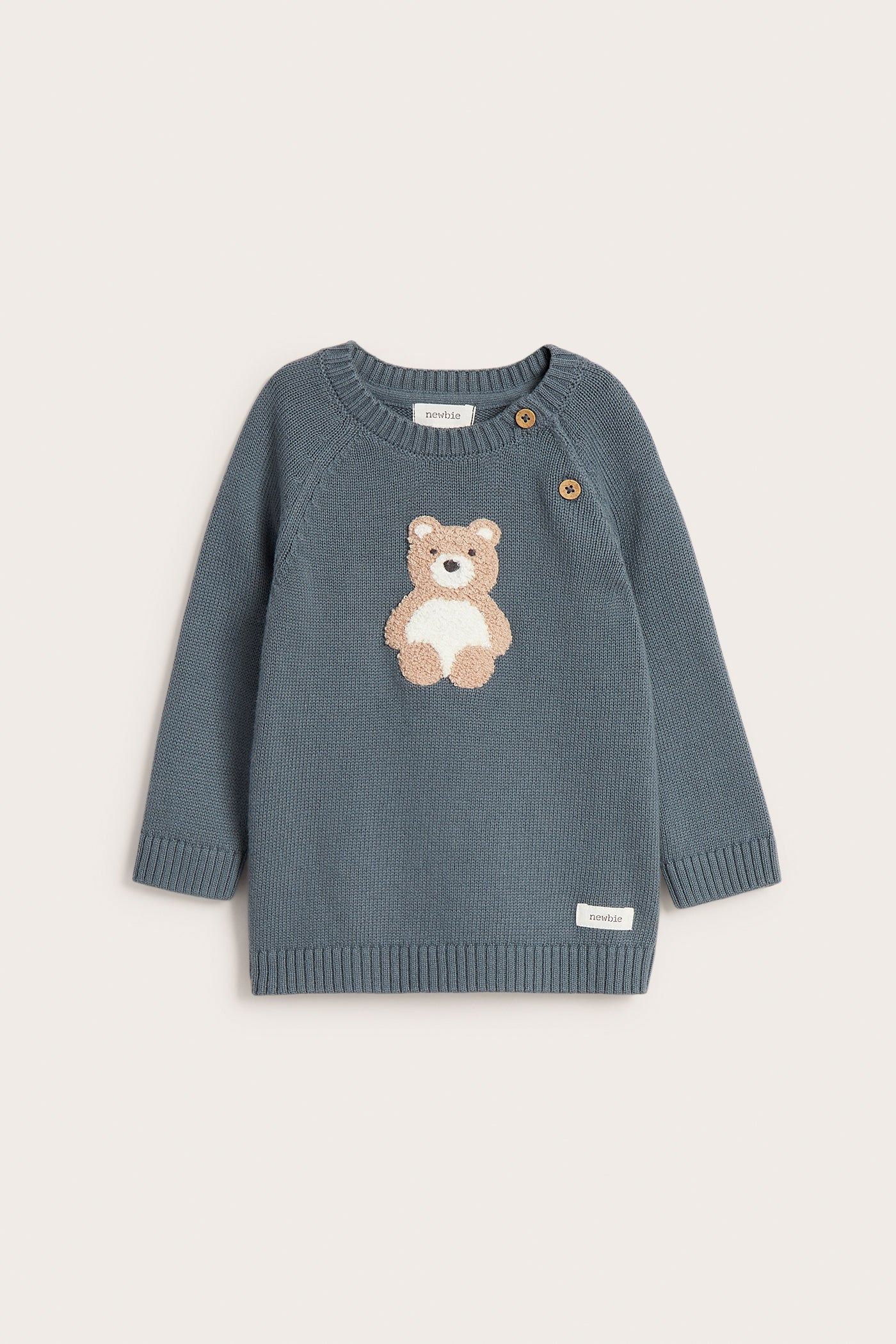 Baby blue jumper with bear appliqué