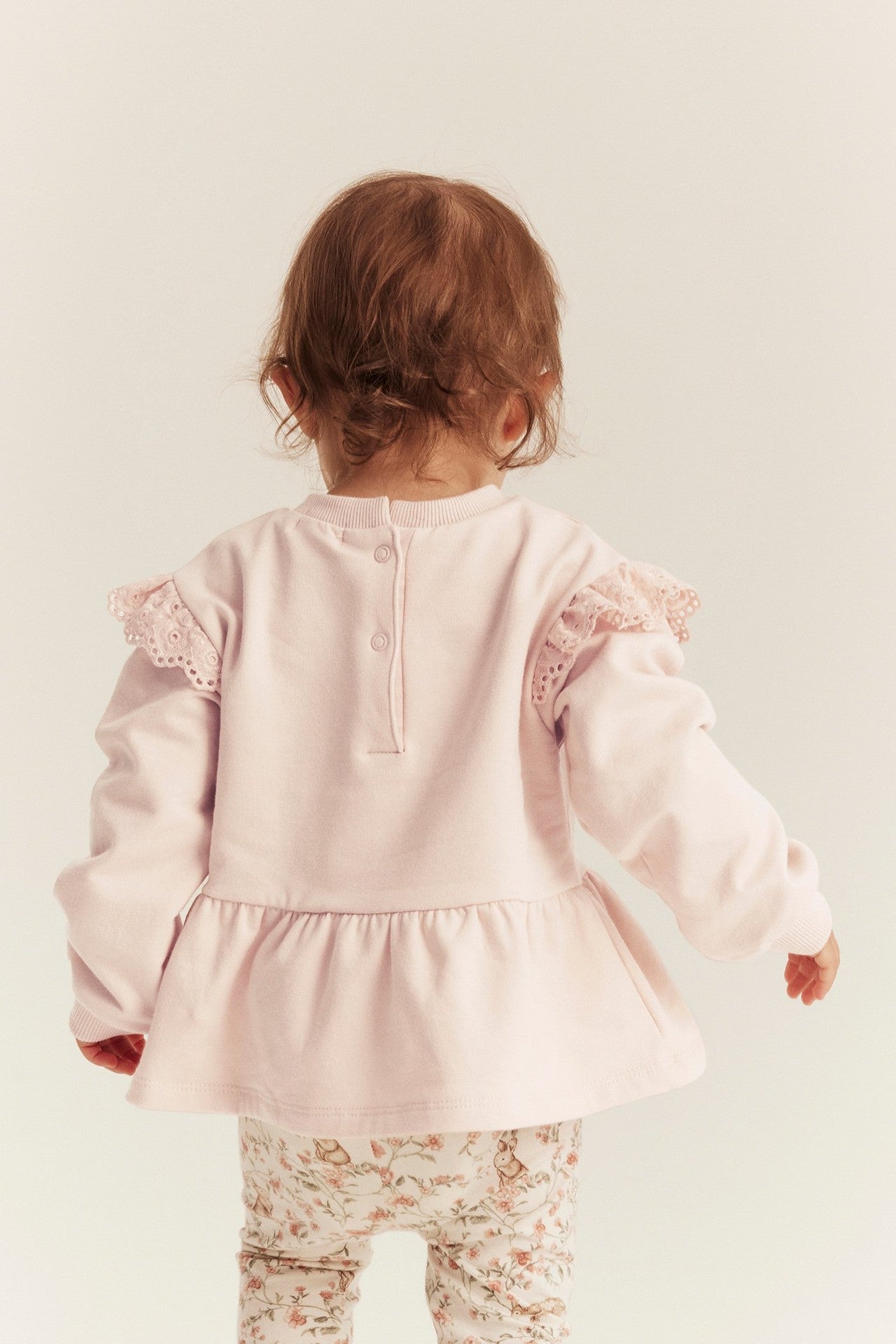 Baby pink sweatshirt with frill