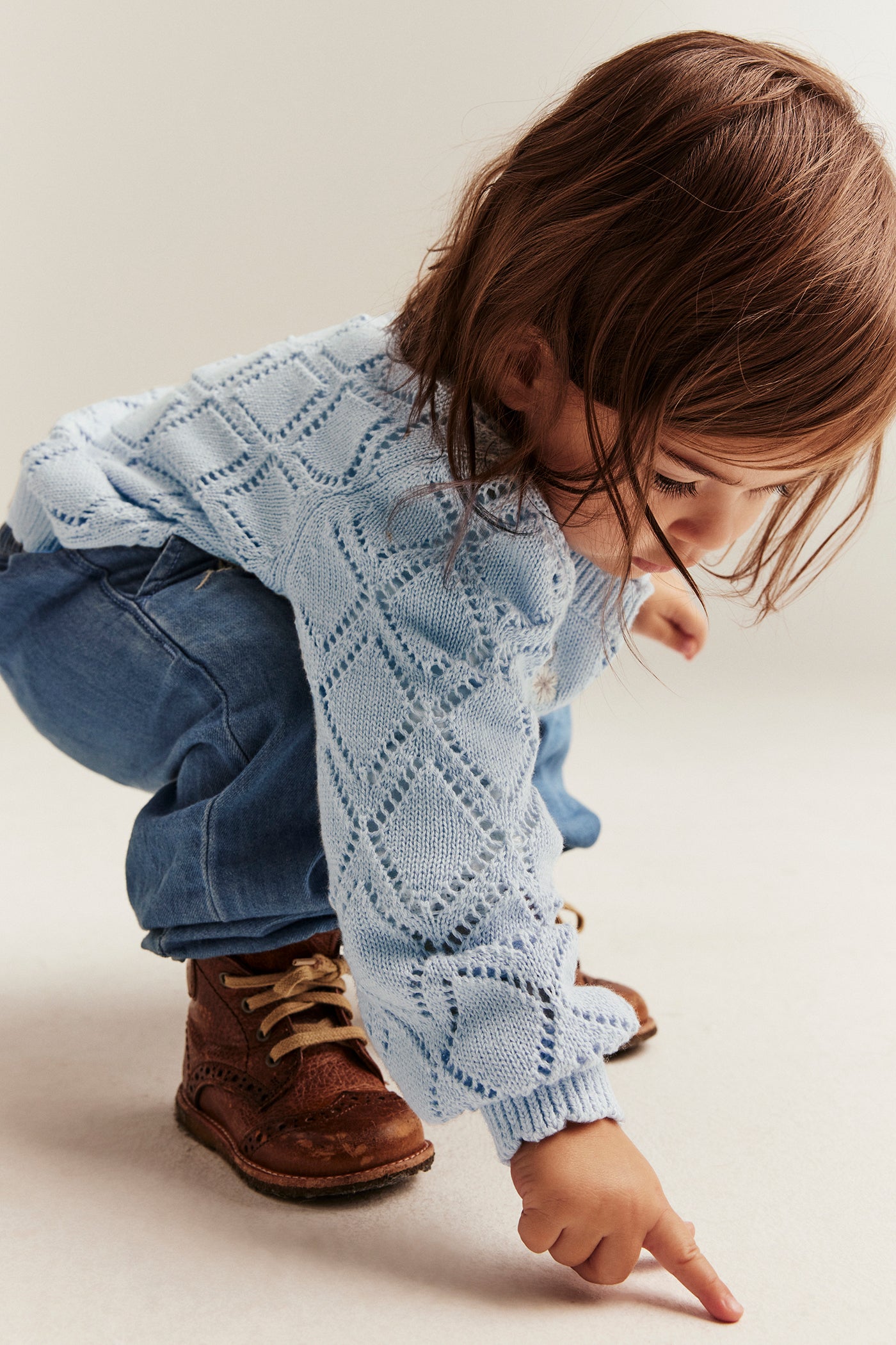 Baby blue knitted cardigan with flowers