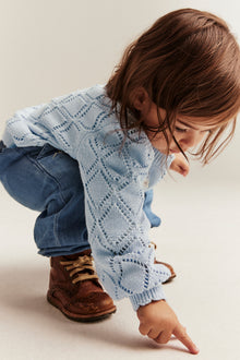 Baby blue knitted cardigan with flowers
