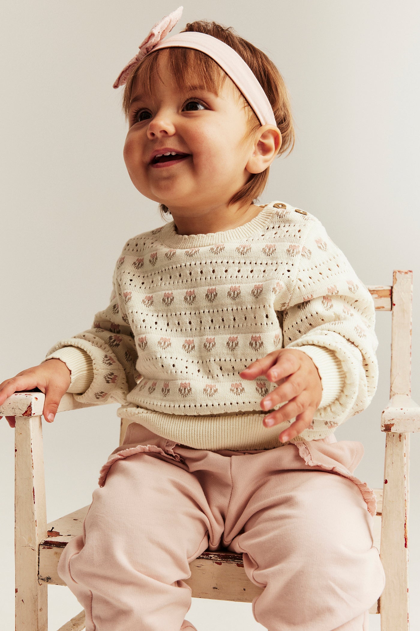 Baby white jacquard-knitted floral jumper
