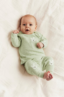 Baby green knitted cardigan with rabbit appliqué