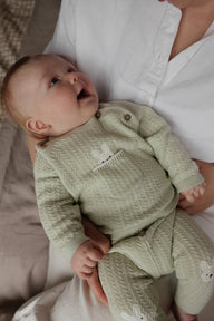 Baby green knitted cardigan with rabbit appliqué