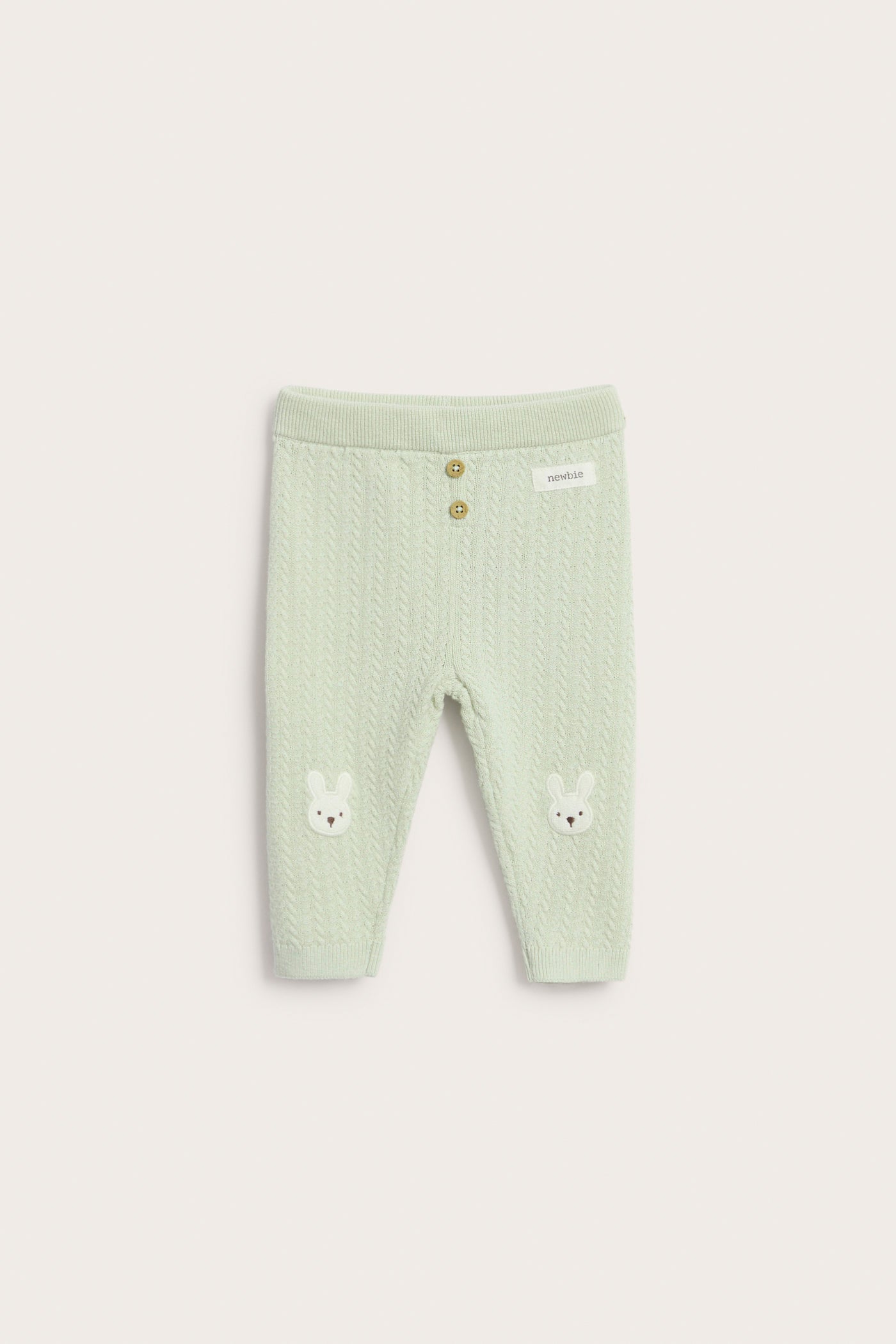 Baby green knitted leggings with rabbit appliqué