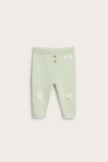 Baby green knitted leggings with rabbit appliqué
