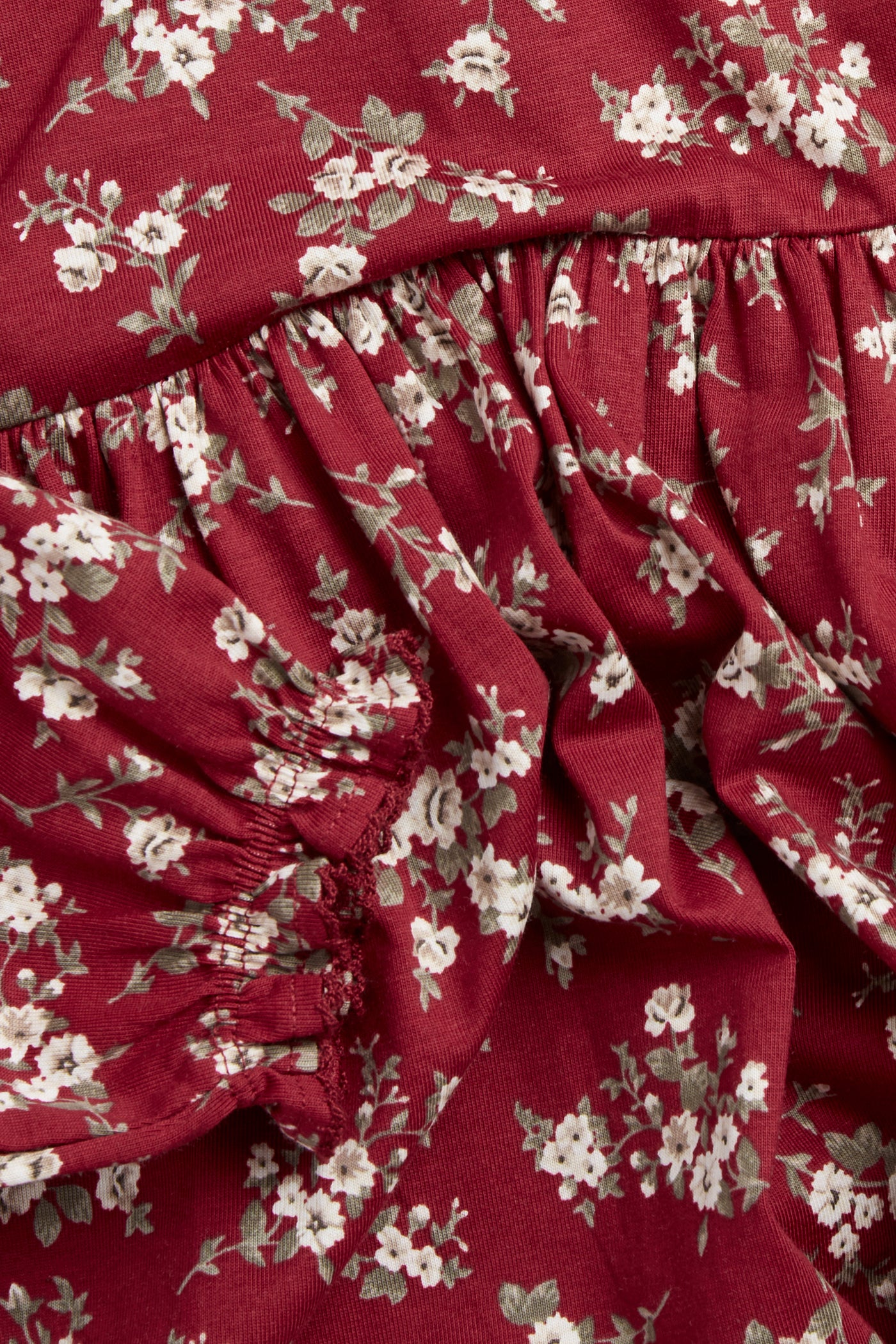 Kids´ red floral dress with puff sleeves