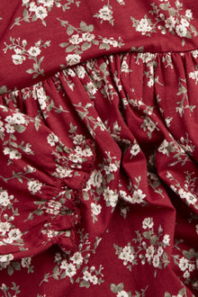 Kids´ red floral dress with puff sleeves