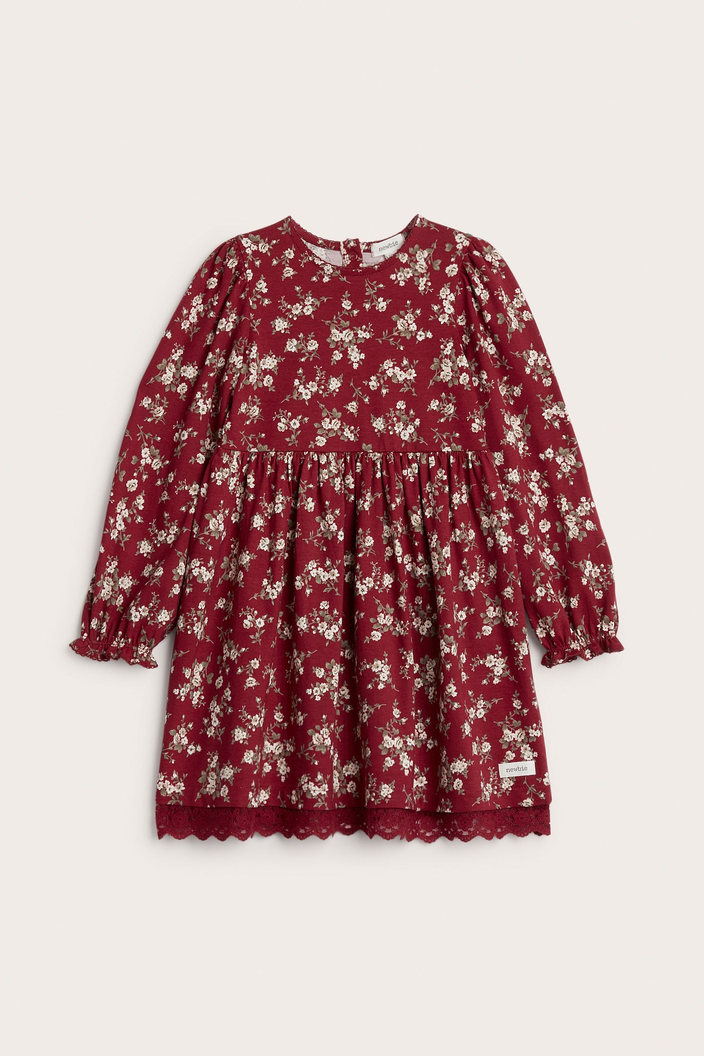 Kids´ red floral dress with puff sleeves